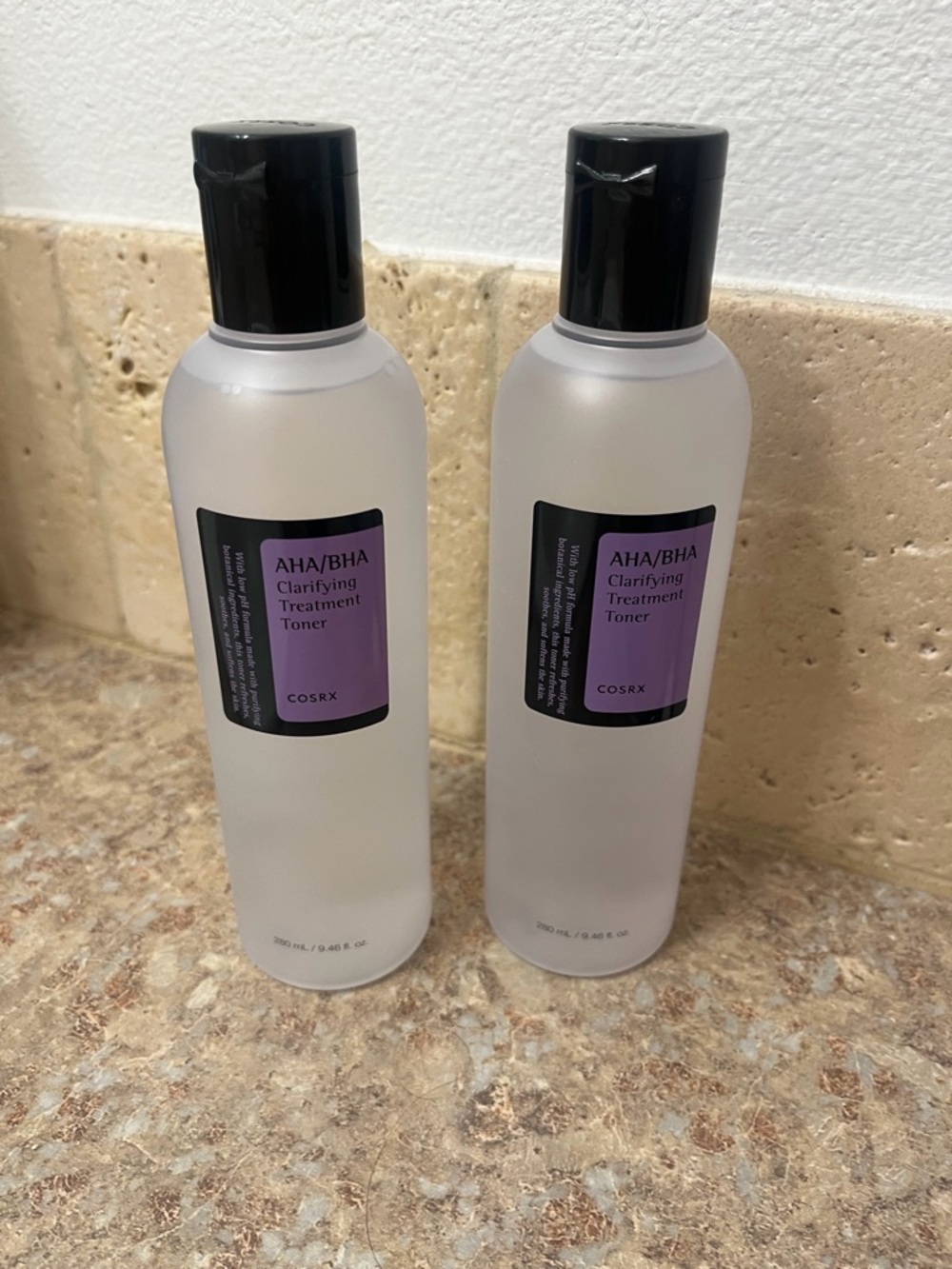 COS AHA/BHA Clarifying Treatment Toner - Black Caps, Purple Labels